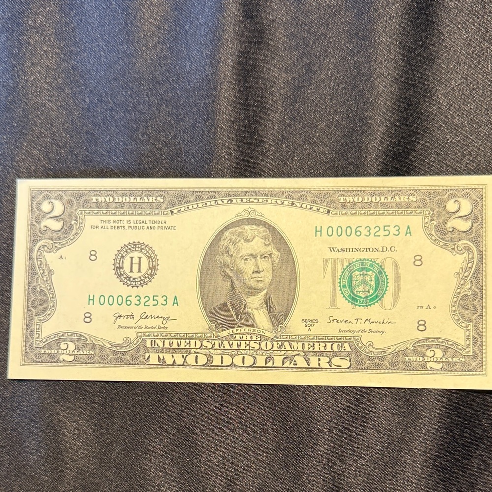 Uncirculated $2 bill with very low serial number.
(H00064253A) - 2017